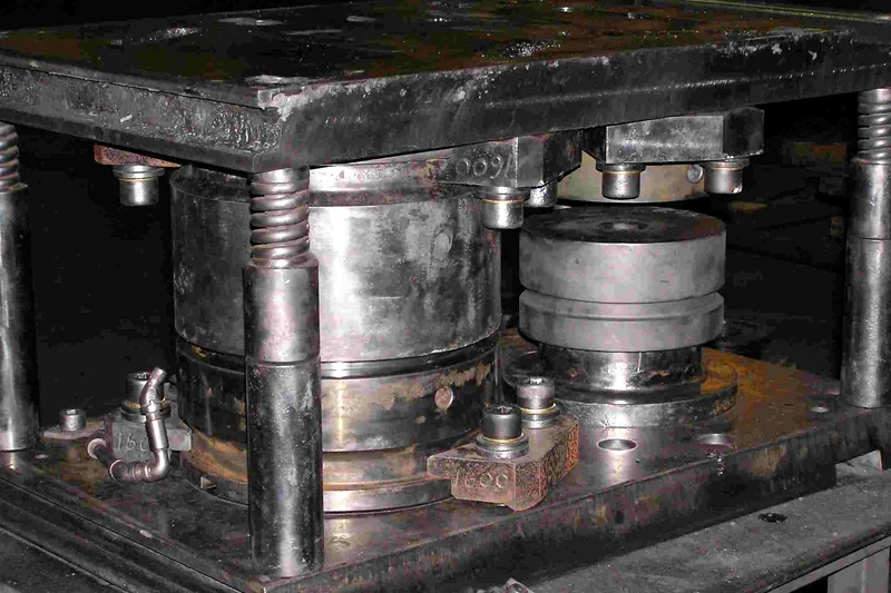 Forging die mounted in a press